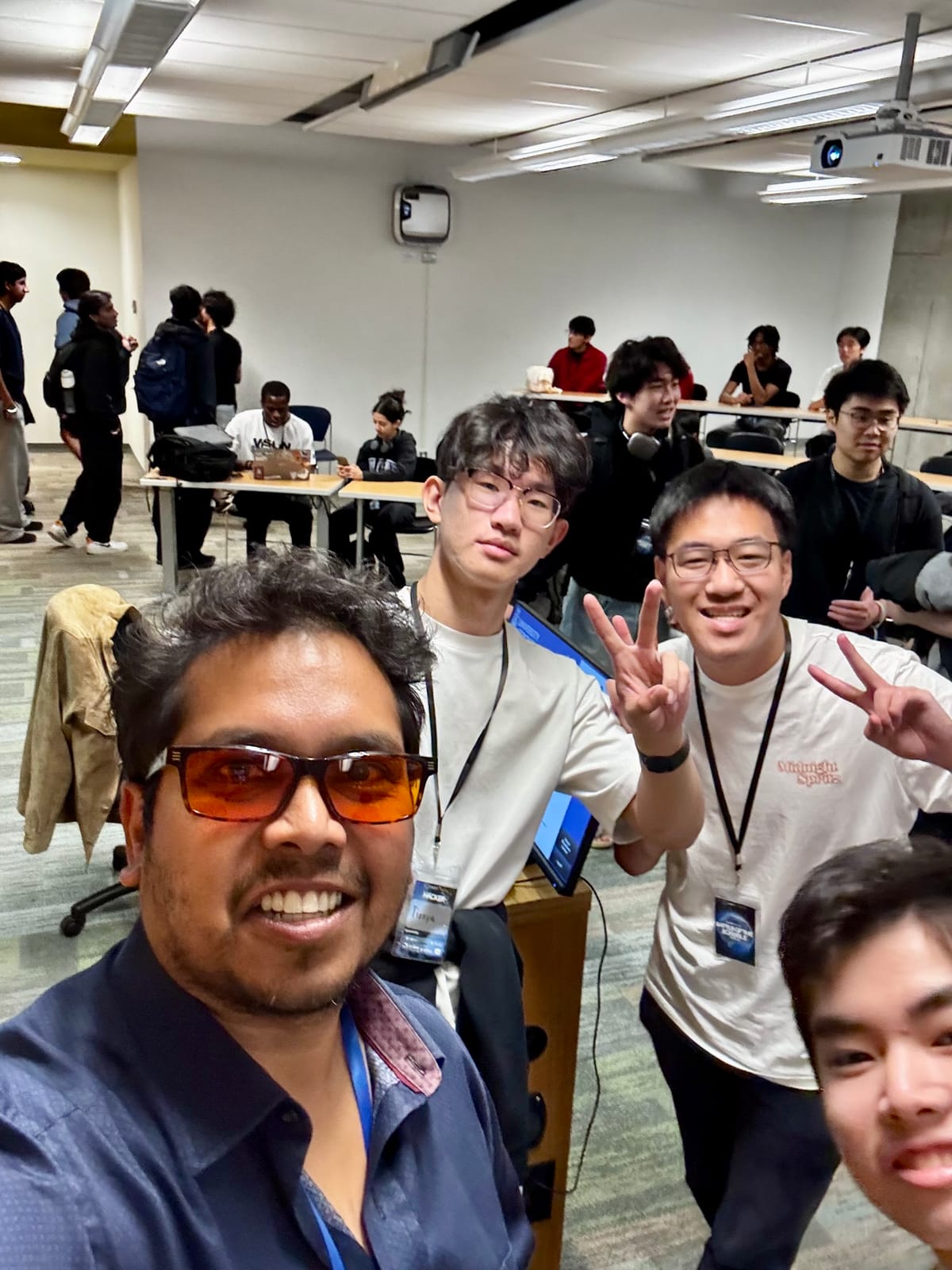 Selfie with participants in the workshop room.